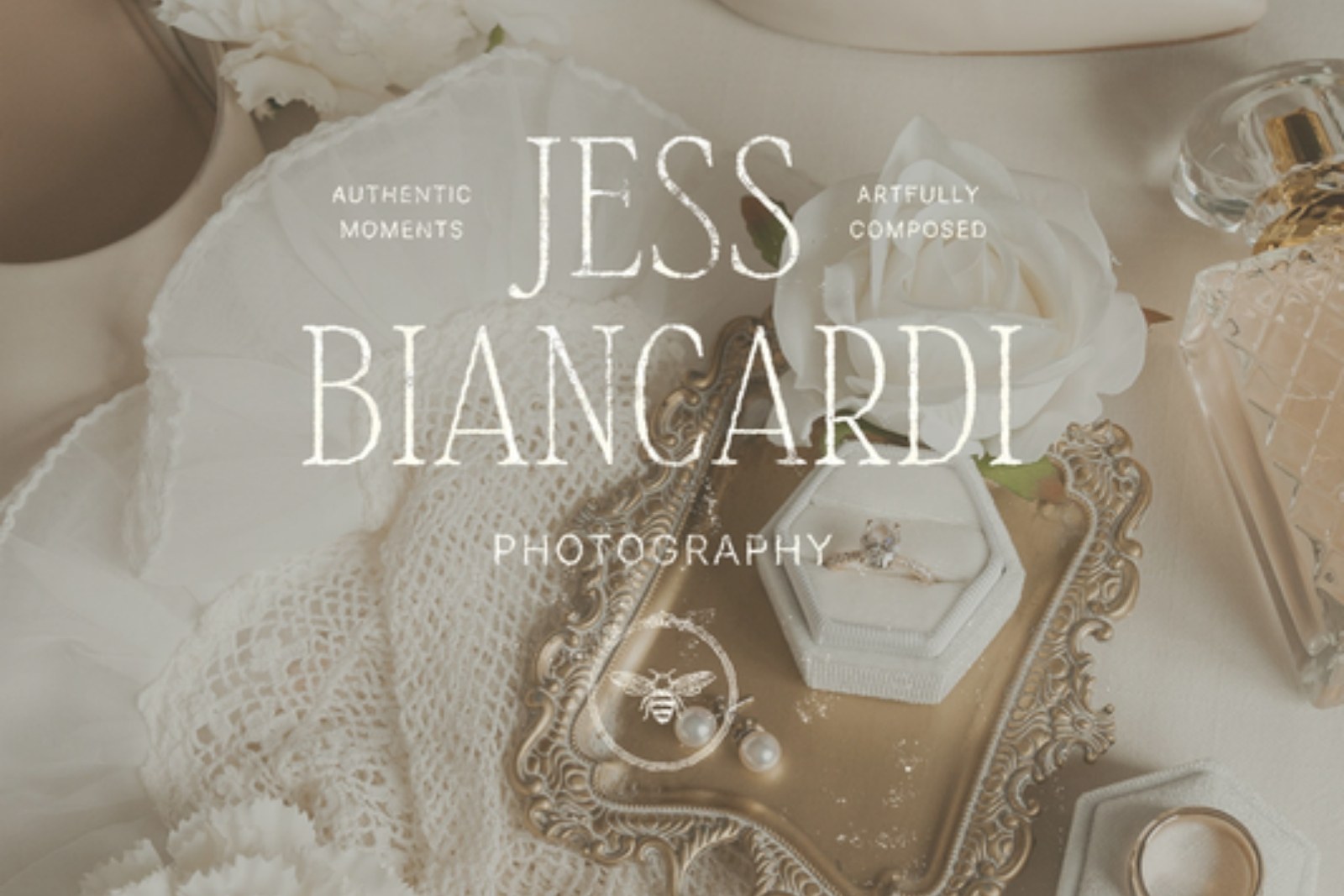 Bridal flatlay of heels, rings and lace gloves with the Jess Biancardi Photography logo