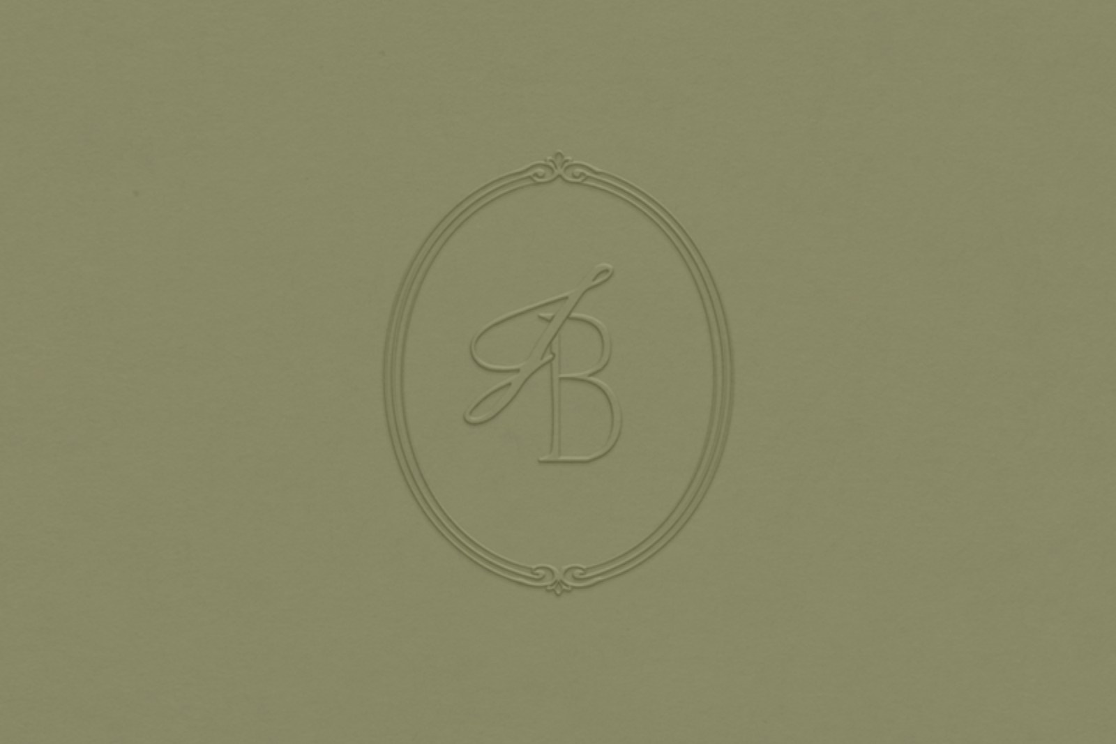 Jess Biancardi JB monogram blind-embossed on sage green paper