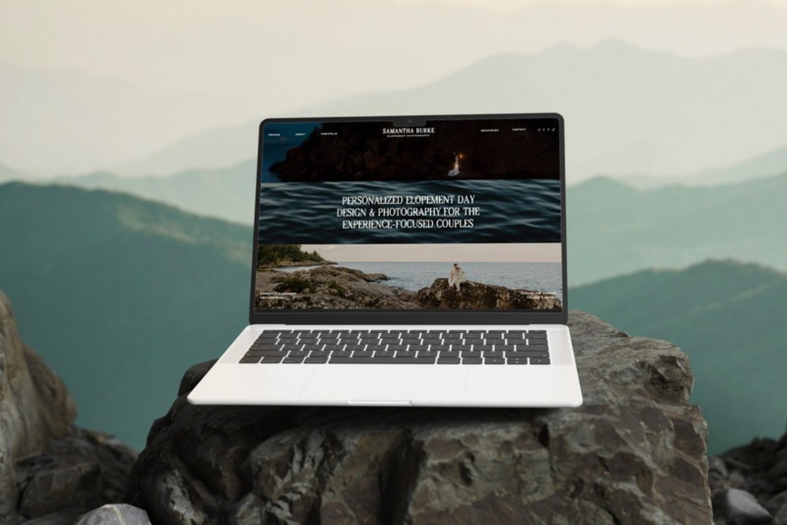 Laptop on a mountaintop displaying the Samantha Burke Photography website